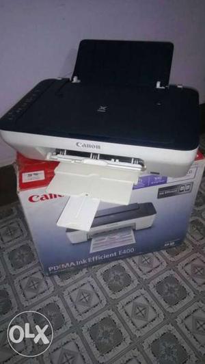 White And Black Canon Pixma Printer ink E400 new condition