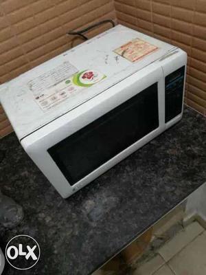 White And Black Countertop Microwave LG Brand