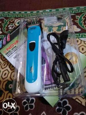 White And Teal Hair Clipper With Power Cord