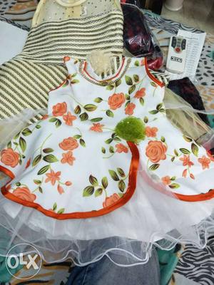 White, Orange, And Green Floral Sleeveless Dress