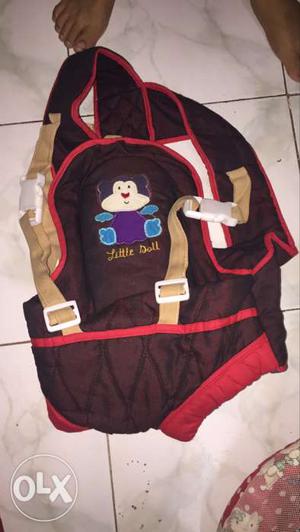 Baby's Maroon And Red Carrier