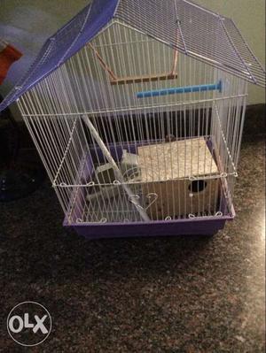 Purple And White Bird Cage
