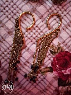 A pair of beautiful ear cuffs and Jhumkis