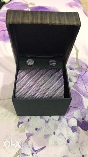 Brand new tie with cuffling.