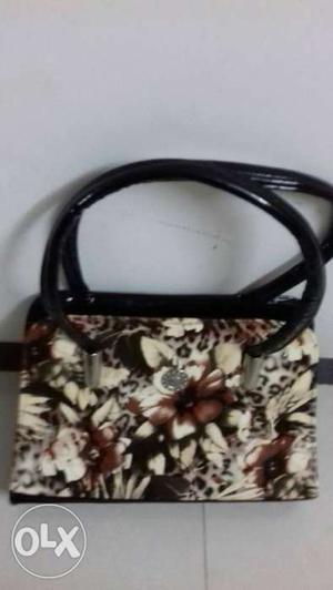 Brown, Black, And White Floral Shoulder Bag & baby girl