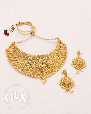 Gold-colored Bib Necklace And Drop Earrings