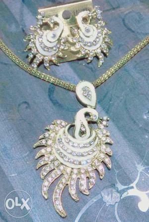 Golden White Enamel Neck Set with Earrings.