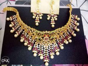 Jeweled And Gold Bib Necklace And Earrings