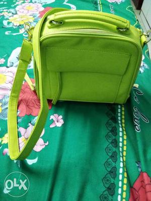 Light green colour bag with good space