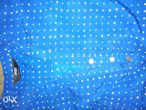 My new white polka dot blue shirt I brought from