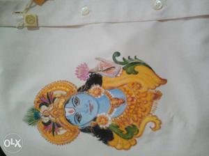 Painted krishna on shirt.