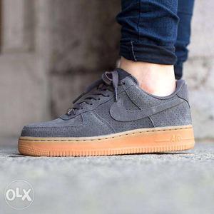 Paired Gray Gum Nike Suede Air Force 1 Low Sneakaer