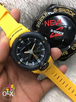 Round Black Casio G-Shock Digital Watch With Yellow Strap