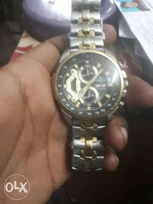 Round Silver And Gold Chronograph Watch With Silver Link
