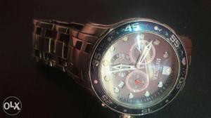 Round Silver-colored Invicta Chronograph Watch With Link