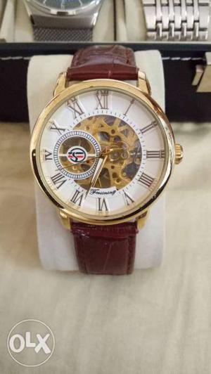 Round White Skeleton Watch With Brown Leather Strap