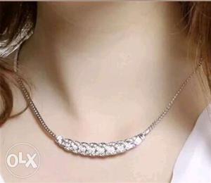 Silver Necklace With Diamond Embellish Pendant