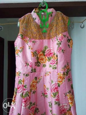 Urgent sale.Brand new Latest floral print gown at never