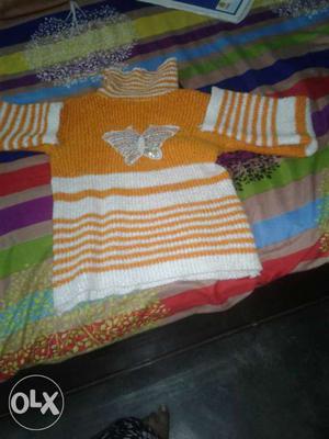 White And Orange Sweater