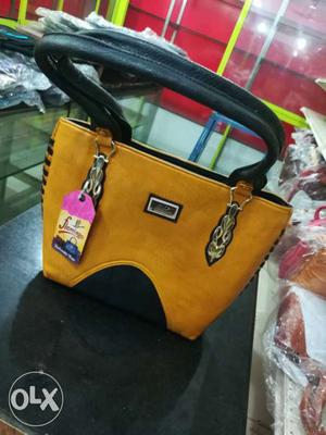 Yellow And Black Leather Tote Bag