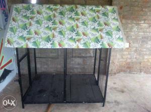Green And Black Pet Kennel