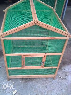 Green And Brown Pet Cage