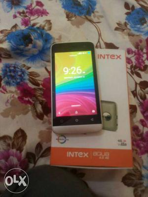 Intex aqua 4g mobile one month used with box n