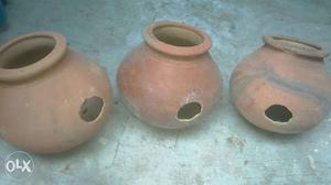 Three Brown Clay Pots