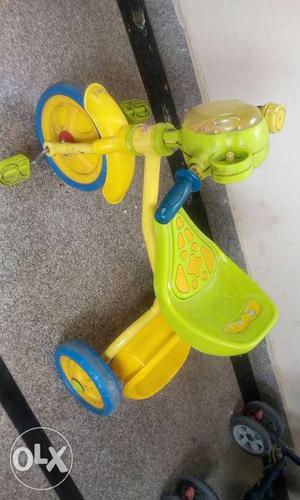 Baby's Yellow, Blue And Green Pedal Trike