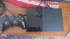Black Sony PS2 Console With Game Controller