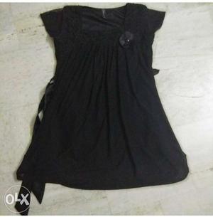 Black Top(Party wear). Size: Small. Looks good.