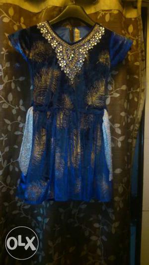 Blue an silver colour velvet frock suitable for