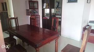Dining table with 6 chairs made up of sesame wood