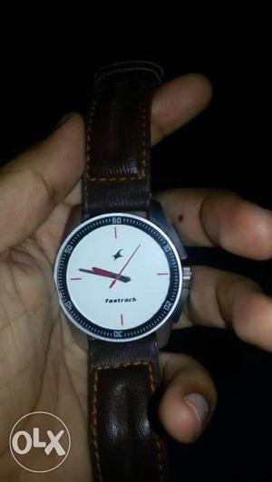 Fastrack watch with coffee color strap