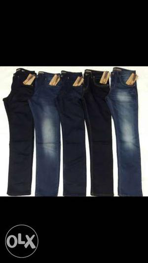 Five Blue-washed Jeans