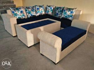 L shape sofa with settee and center table