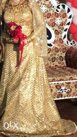 One time used bridal golden frock