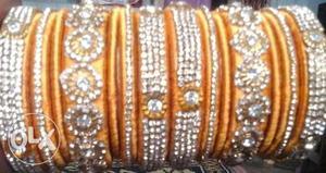 Orange And Silver Bracelets