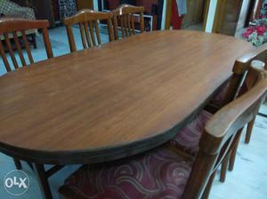 Oval Brown Wooden Dining Table Set