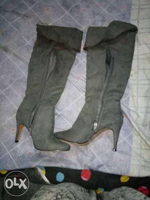 Pair Of Beige Leather Heeled Boots