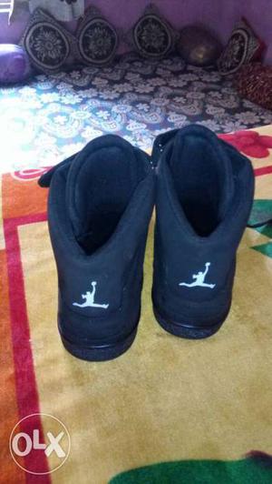 Pair Of Black used Air Jordan Basketball Shoes