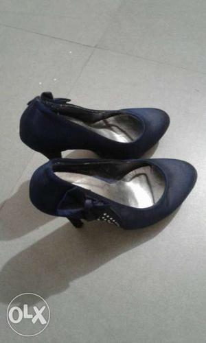 Pair Of Blue Stilettos