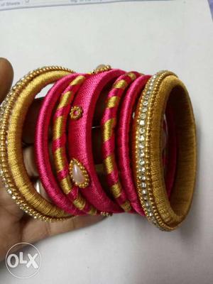 Pink Nd gold colour set of thread bangles with