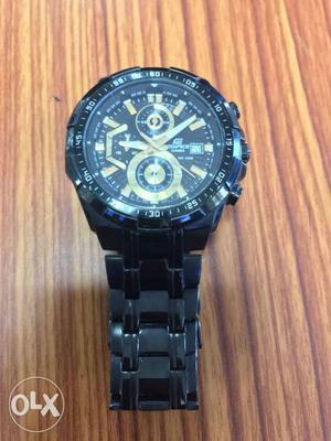 Round Black And Gold-colored Casio Edifice Chronograph Watch