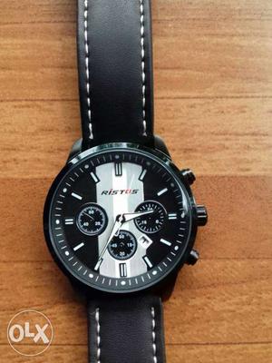 Round Faced Chronograph Watch With Black Leather Strap