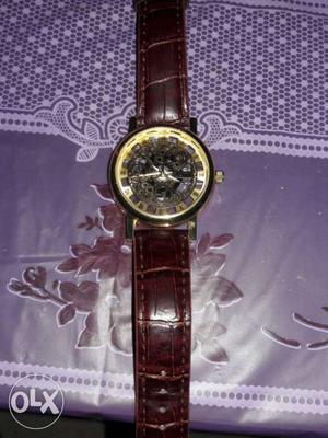 Round Gray Skeleton Watch With Brown Leather Strap