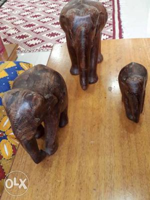 Three Brown Wooden Elephants Figurines