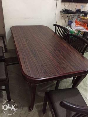 Wooden dinning table with 6 chairs