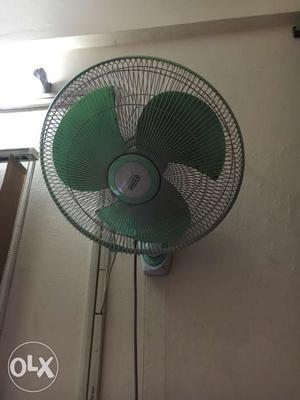 Green And White Oscillating Wall Fan