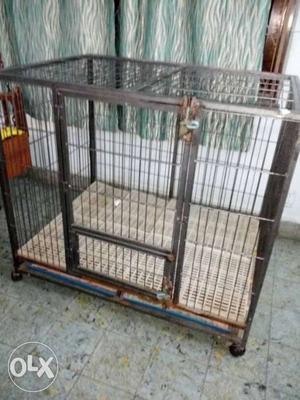 A big dog cage for sale